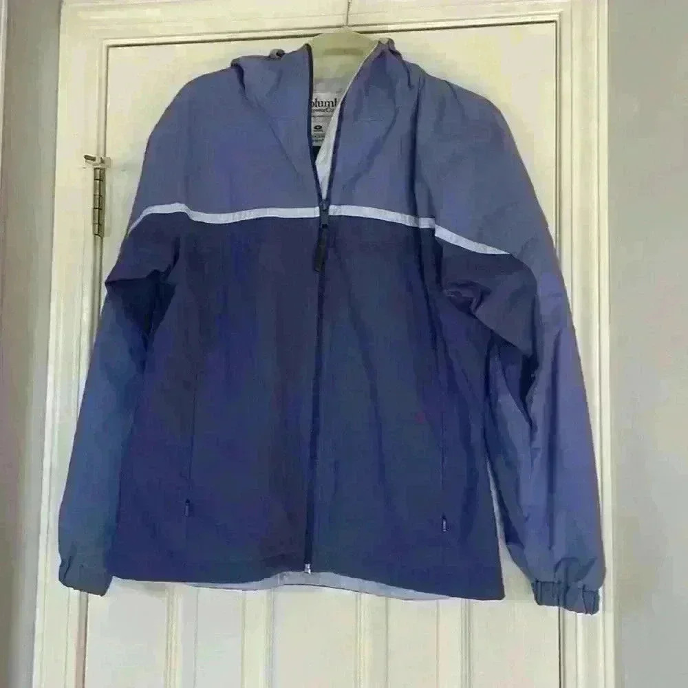 Vintage hooded Columbia women's rain jacket in color block blues